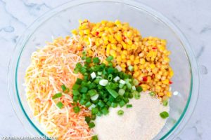 How to make Hot Corn Dip, mixing all the ingredients in a bowl