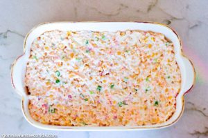 How to make Hot Corn Dip, spread in a casserole dish ready to be baked