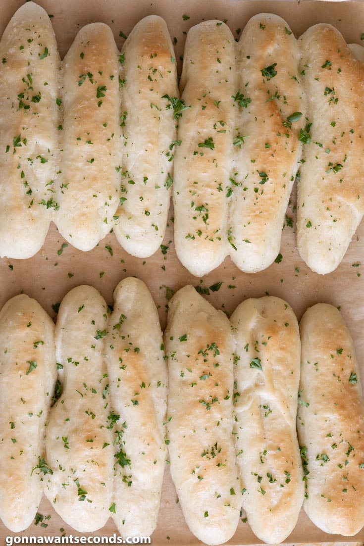 Olive Garden Breadsticks on a parchment paper, top view