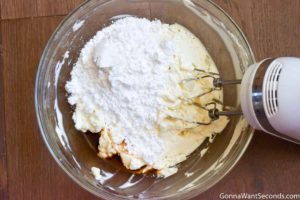 Step 4 How to make Cherry Delight recipe, adding confectioners sugar