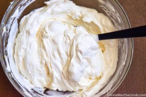 Step 5 How to make Cherry Delight recipe, folding the cool whip into the mixture