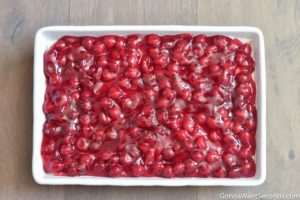 Step 8 How to make Cherry Delight recipe, topping the cherry pie filling