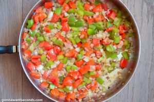 How to make Sausage and Rice, sauteing the veggies