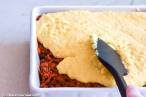 How to make Chili cornbread casserole, spreading the cornbread mixture