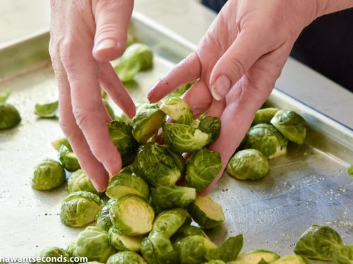 How to make Cheesy Roasted Brussels Sprouts, coating with oil
