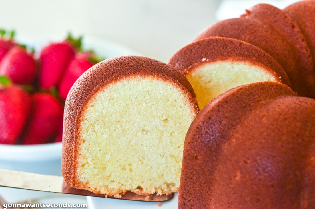 Cutting a portion of Old Fashioned Pound Cake