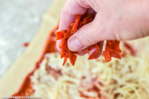 How to make Pizza Pinwheels, sprinkling pepperoni