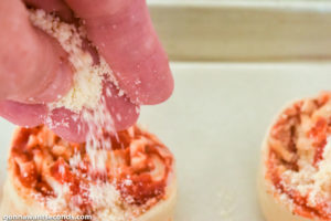 How to make Pizza Pinwheels, sprinkling cheese