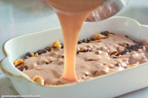 How to make Frito Bars, pouring peanut butter mixture