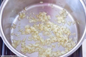 How to make Greek Rice recipe, sauteing onions and garlic