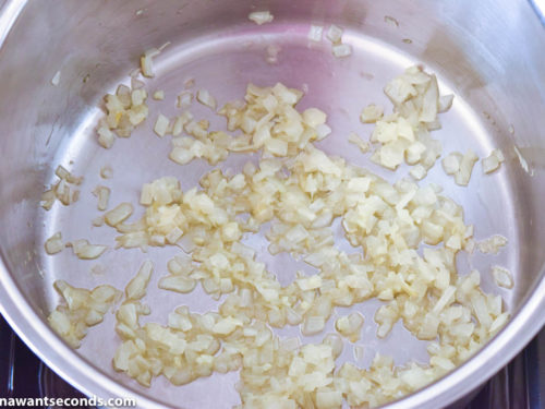 How to make Greek Rice recipe, sauteing onions and garlic