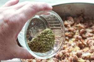How to make Spaghetti Stuffed Garlic Bread, adding Italian seasoning