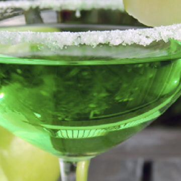 green apple martini in a martini glass