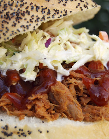Pulled pork sandwiches are an all time favorite in my family. Luscious shredded pork drenched in sweet bbq sauce topped with coleslaw on a soft roll, what's not to love? 