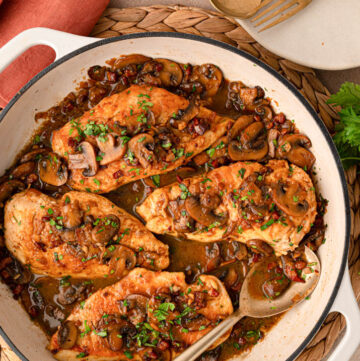 Chicken marsala with sauce in a pan