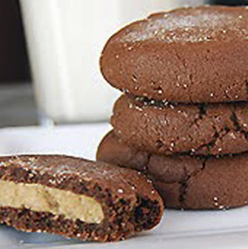 Magic Middle Peanut Butter Cookies stack on top of each other.
