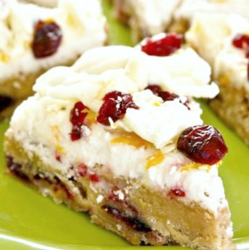 Cranberry Bliss Bars on a green plate
