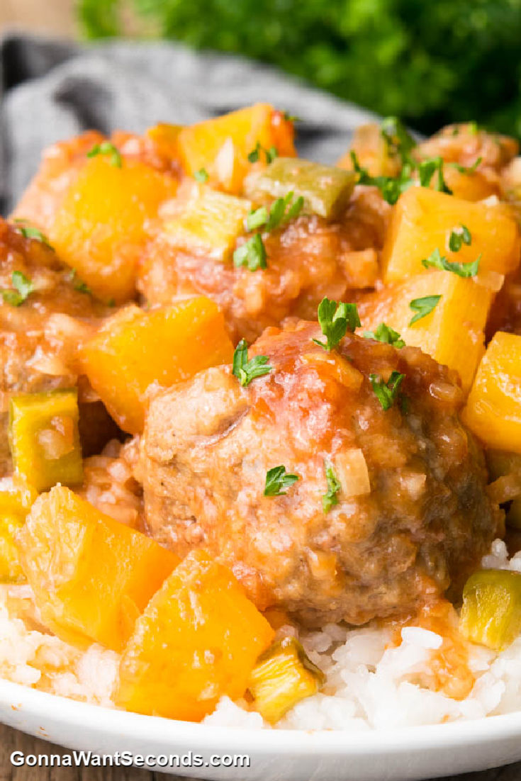 sweet and sour meatballs with frozen meatballs with pineapple bits on top of rice