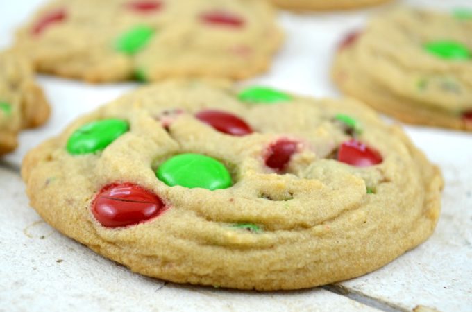 Soft Batch Christmas M&M Cookies on a white wooden table