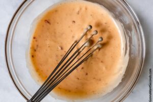 bang bang shrimp sauce in a mixing bowl