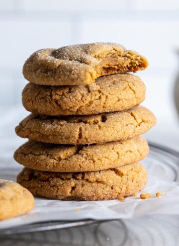 chewy double ginger cookies stack on top of each other