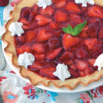Strawberry Pie topped with whipped cream