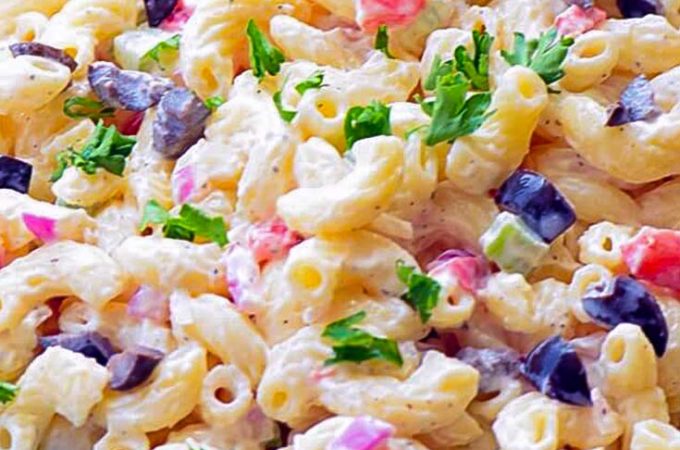 Classic macaroni salad is a symphony of flavors and textures perfectly blended with a secret ingredient for a superior salad like grandma used to make. #ClassicMacaroniSalad #MacaroniSalad