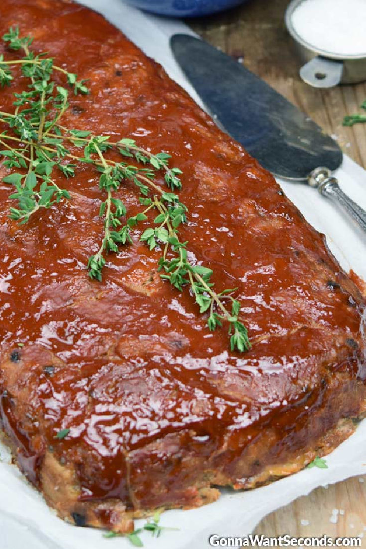 old fashioned turkey meatloaf garnished with thyme leaves on top
