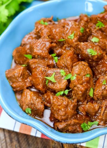 Carne Guisada- deliciously stewed chunks of beef in a chile, cumin, tomato gravy