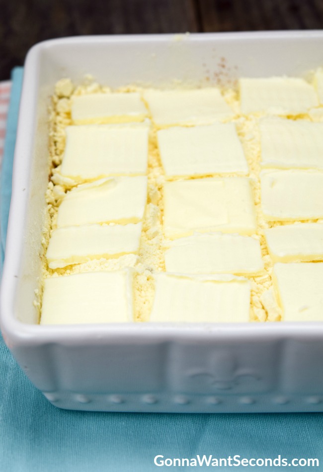 Sliced butter on top of a cake mix