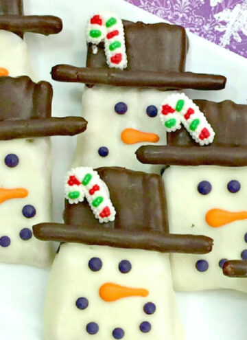 pretzel snowmen on a platter