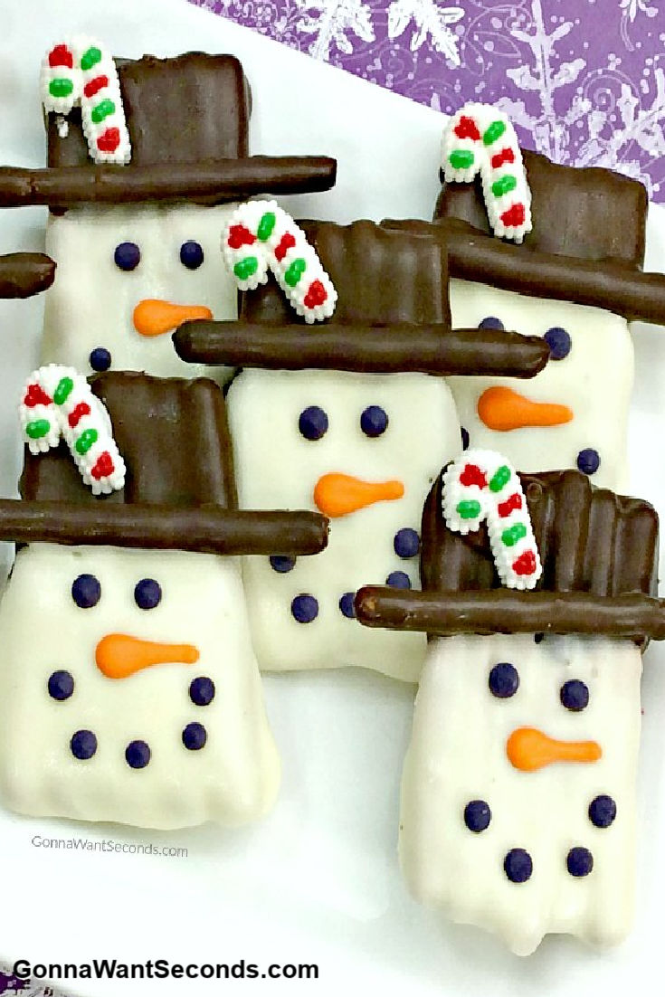 snowman pretzels on a platter