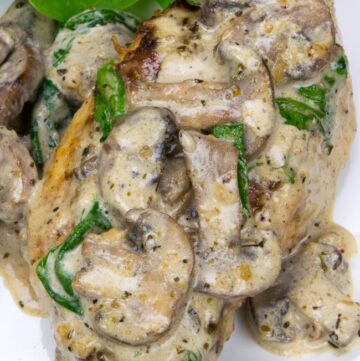 Chicken florentine smothered with sauce and mushroom