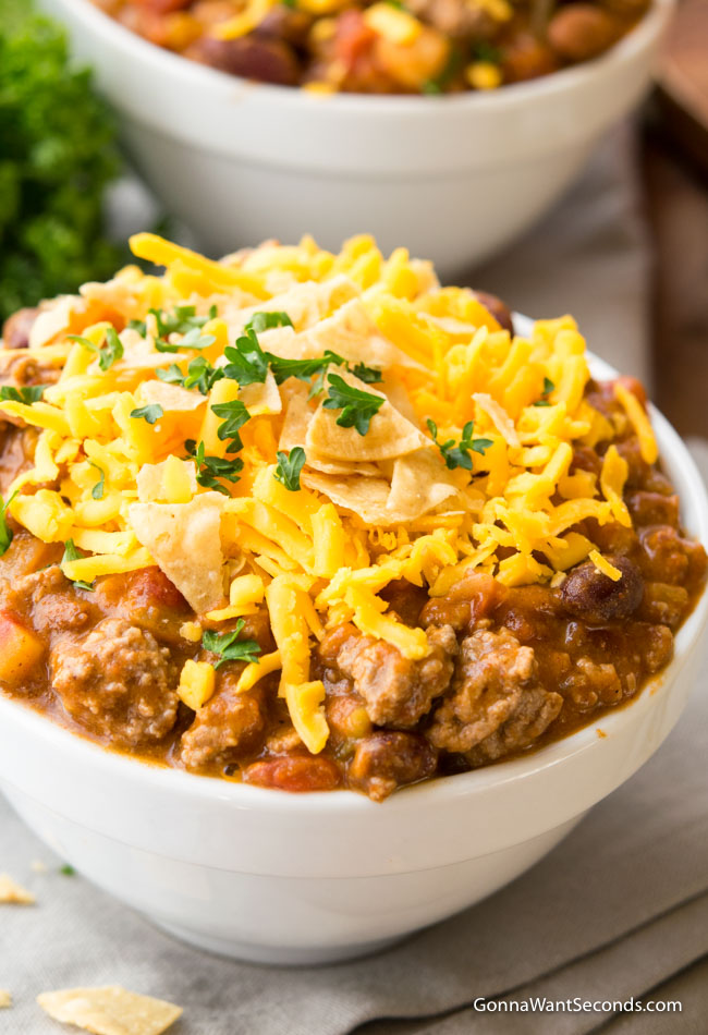 Taco Chili topped with shredded cheese in a white bowl