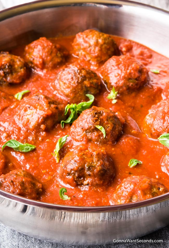 Baked Meatballs in a pot of sauce