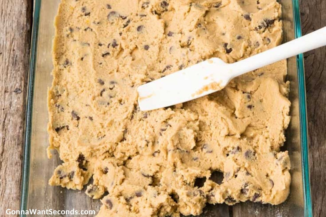 How to make Brookies, spreading cookie dough in the baking pan