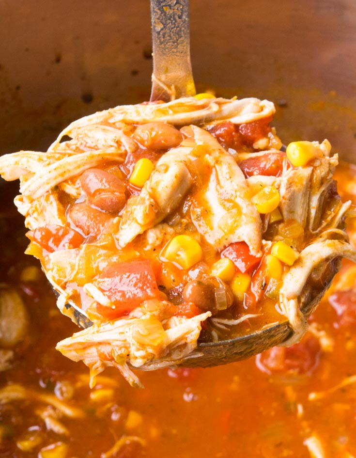 Scooping Chicken Taco Soup from a pot
