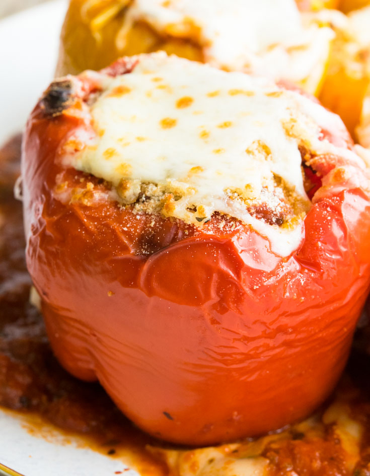 Italian Stuffed Peppers topped with melted mozzarella cheese