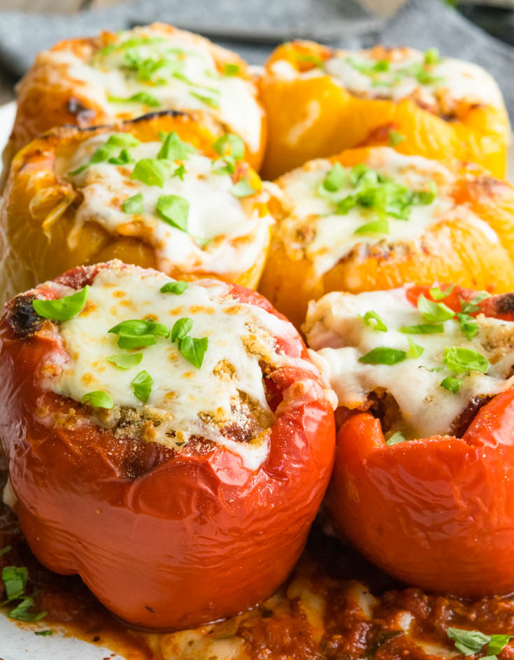 Italian Stuffed Peppers topped with melted mozzarella cheese 