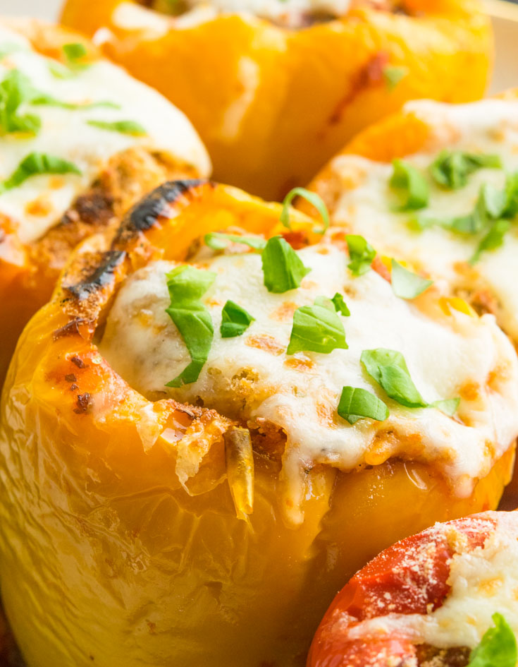 Italian Stuffed Peppers topped with melted mozzarella cheese 