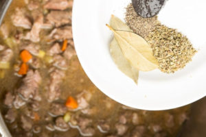 Adding seasoning in the pot