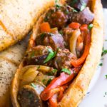 italian sausage and peppers and onions in an Italian sausage rolls