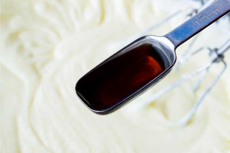 Adding vanilla to the butter-egg mixture