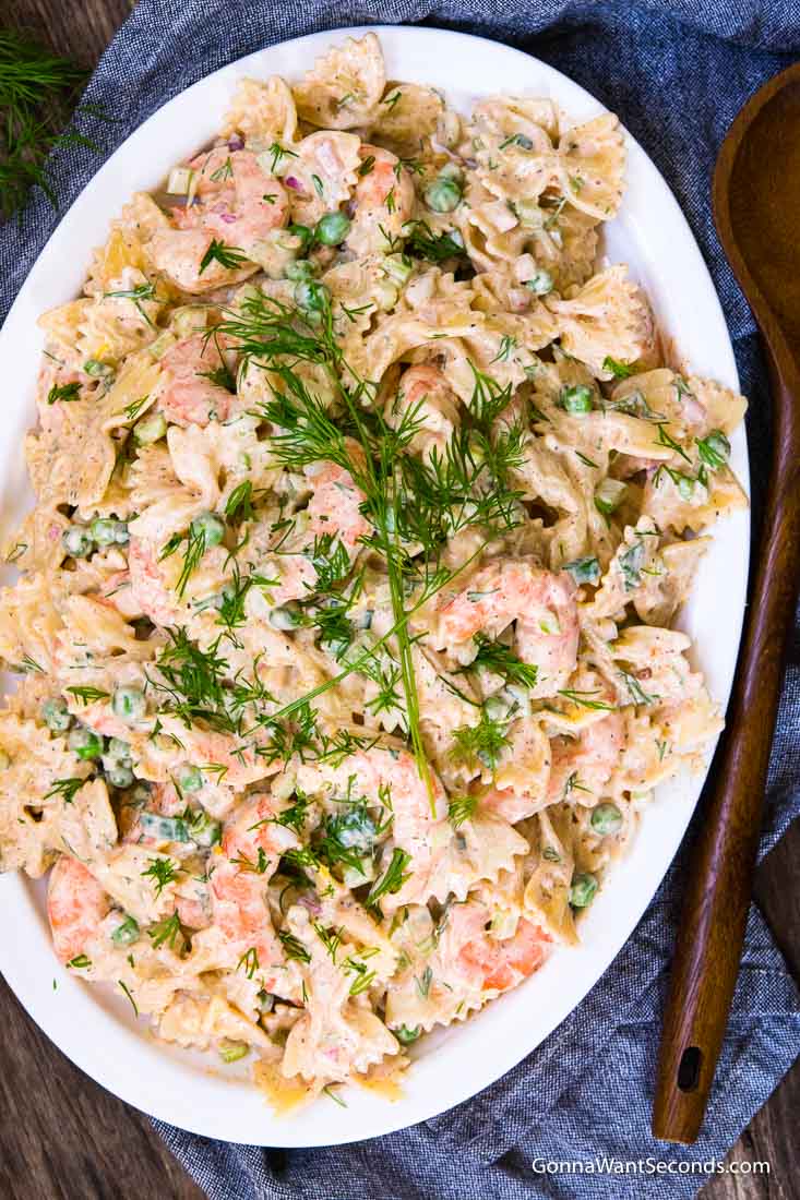 shrimp pasta salad with mayo on an oval serving plate