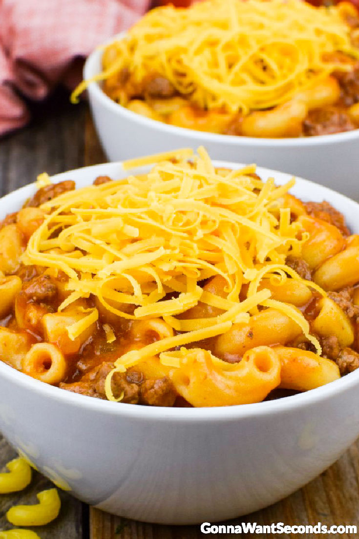 This homemade beefaroni is a hearty satisfying dish that appeals to the palates of children, the hearts of moms and the appetites of all who enjoy it! #Beefaroni #Macaroni Beefaroni topped with shredded cheese