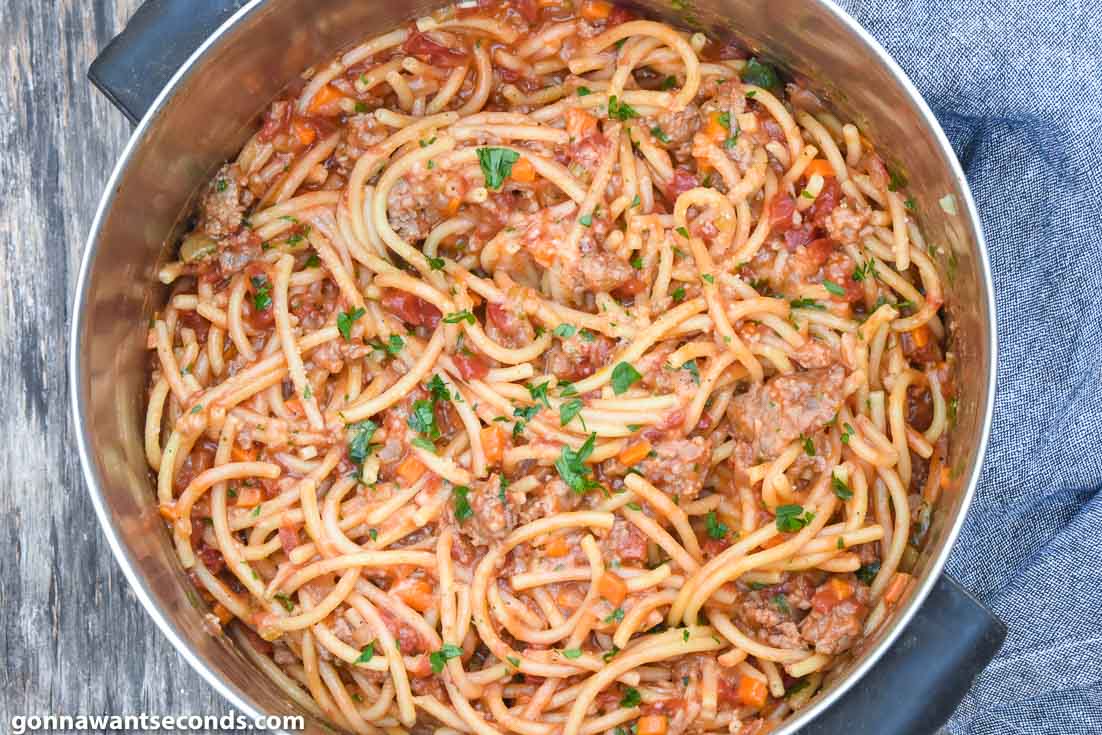 How To Make One Pot Pasta, adding bucatini in the pot 