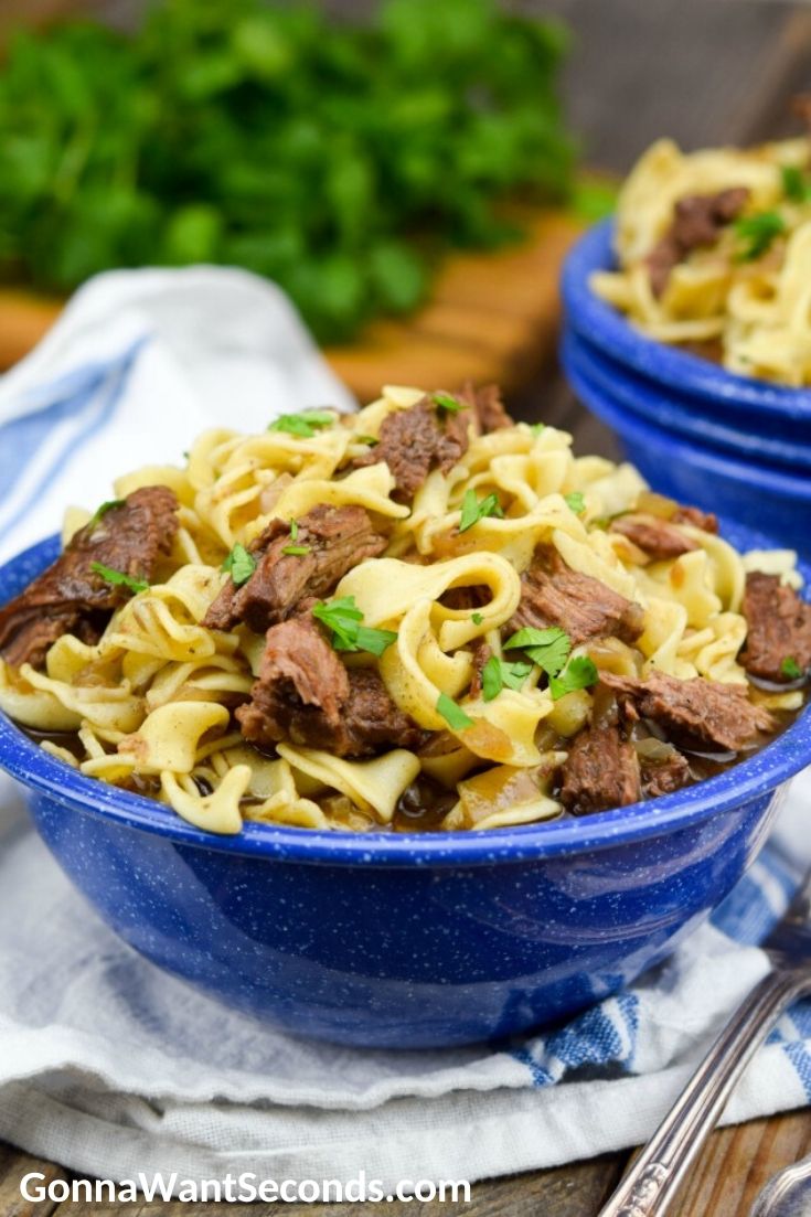 Beef noodles in a blue bowl
