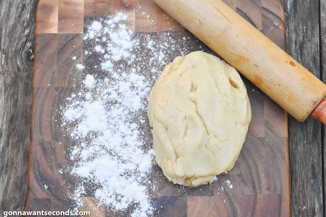 Step by step how to make biscochitos, dough with rolling pin