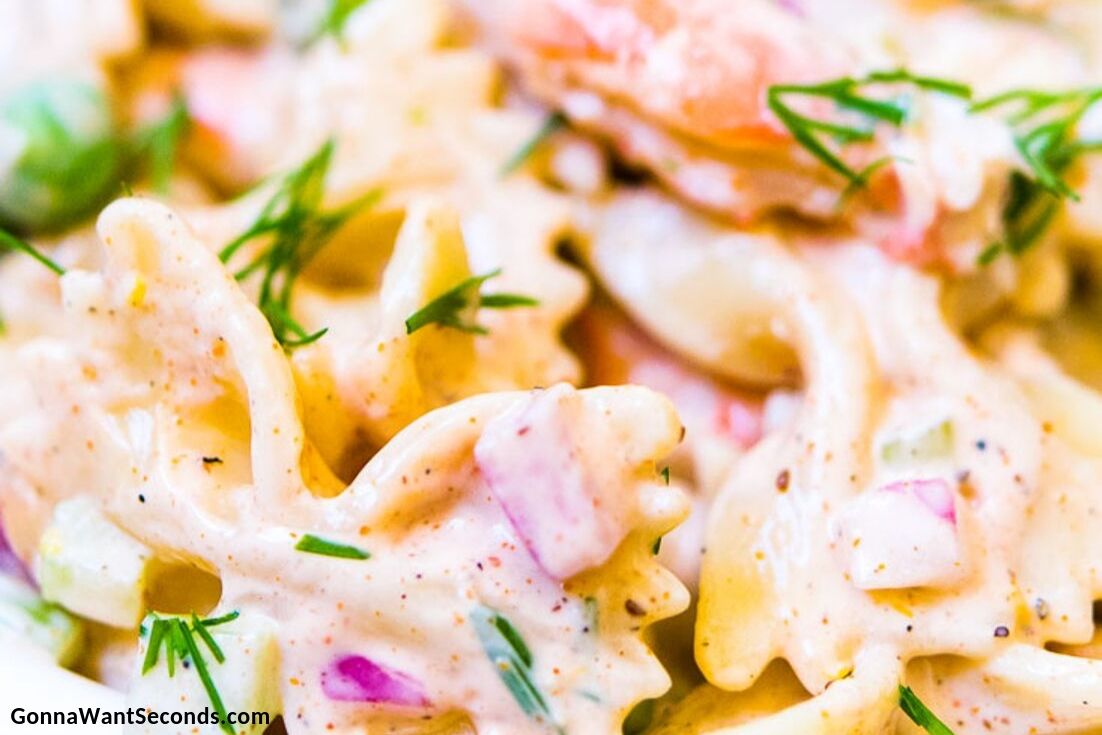 Close up, Shrimp Pasta Salad garnished with fresh dill