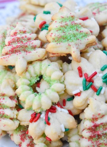A pile of Spritz Cookies on a plate